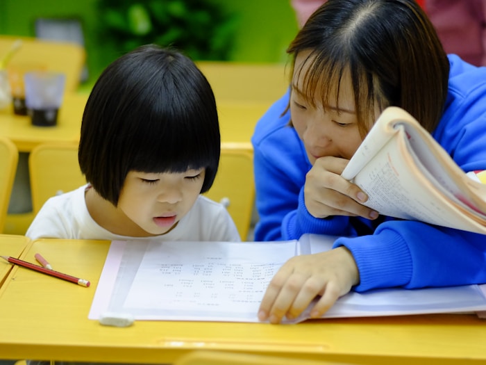 Therapist working with child on developmental activities